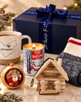 Christmas Eve Box — The Night Before Set: navy Gitano gift box with maple candle, Hintonburg ceramic mug, wool socks, Santa ornament and a log cabin ornament kit