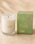 LOHN ORO scented candle with pale-green floral box — Toronto-made essential oil candle in the New-Home Ritual housewarming gift box
