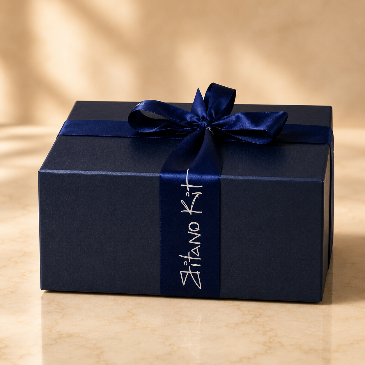 Gitano Kit navy gift box with ribbon — signature packaging