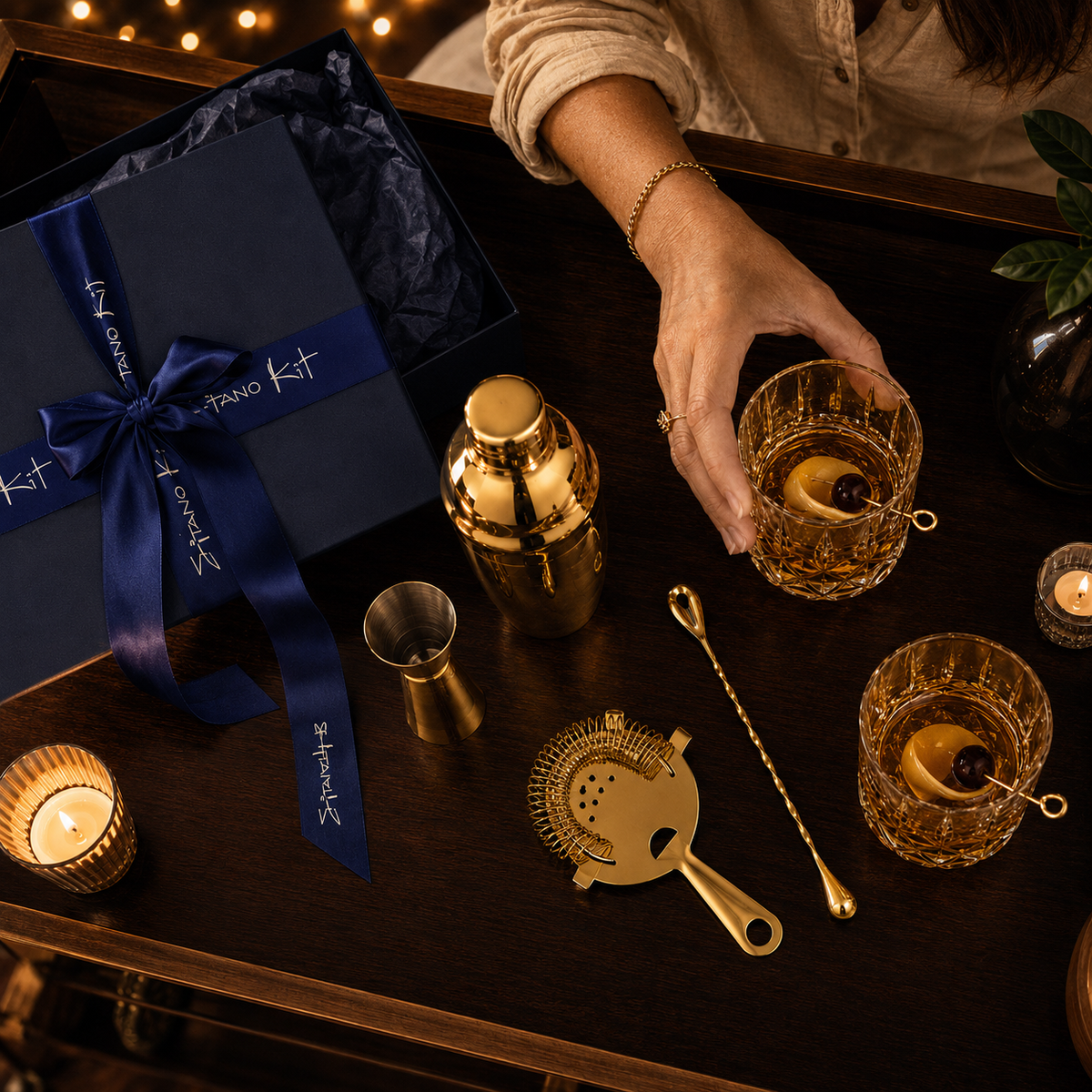 Golden hour cocktail set lifestyle photo 2 - luxurious cocktail setup with warm candlelight glow