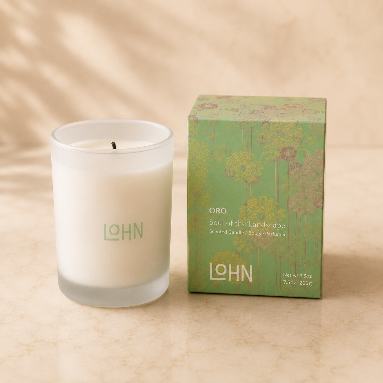 LOHN ORO scented candle with pale-green floral box — Toronto-made essential oil candle in the New-Home Ritual housewarming gift box