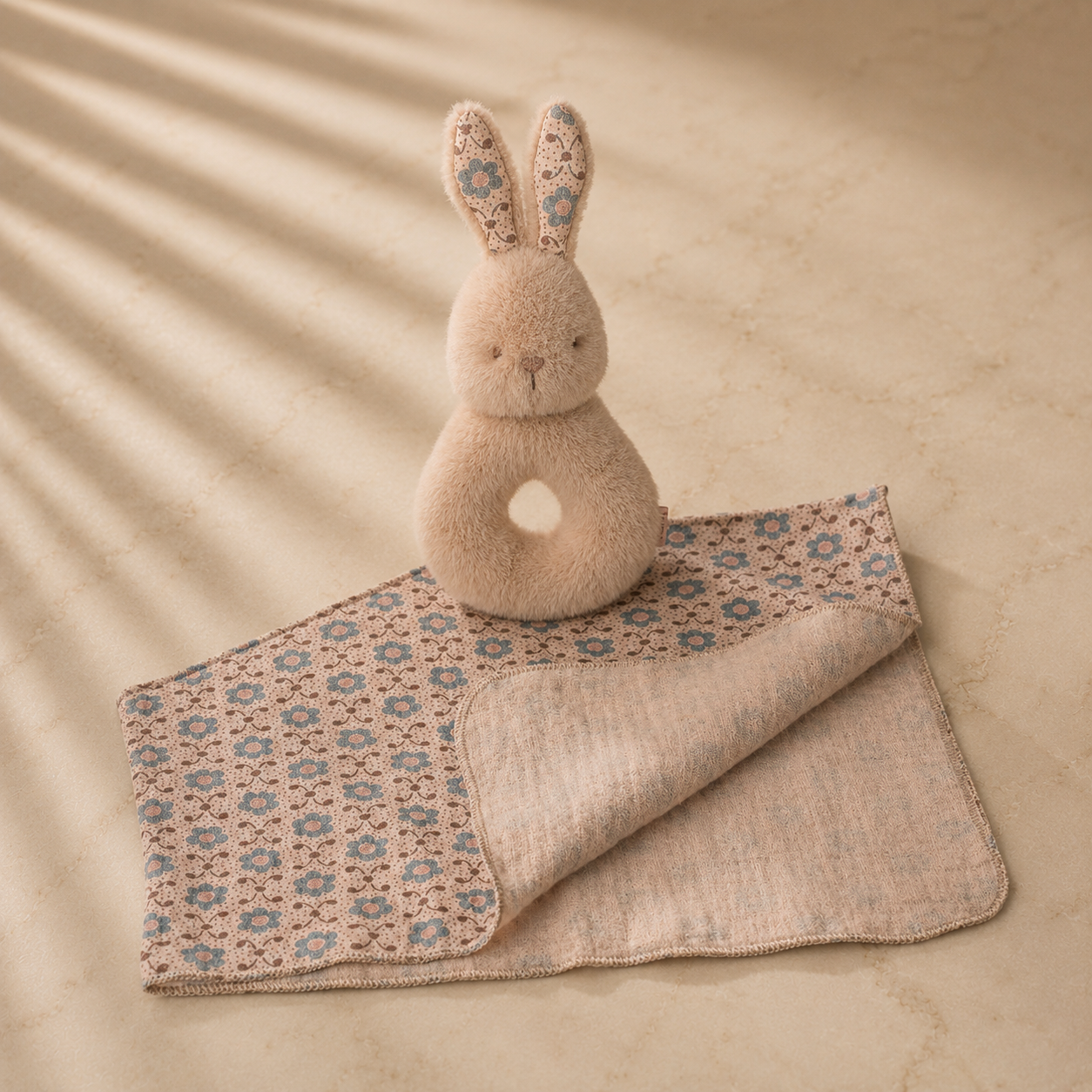 Maileg Rabbit Rattle Set in Cream Peach, unpackaged